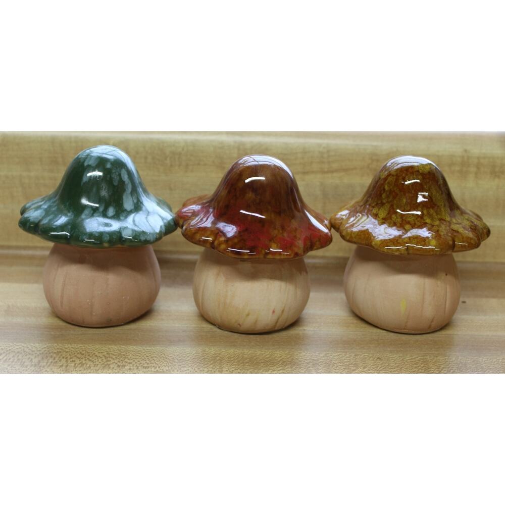 Groovy trio of mid-century inspired glazed ceramic mushrooms.